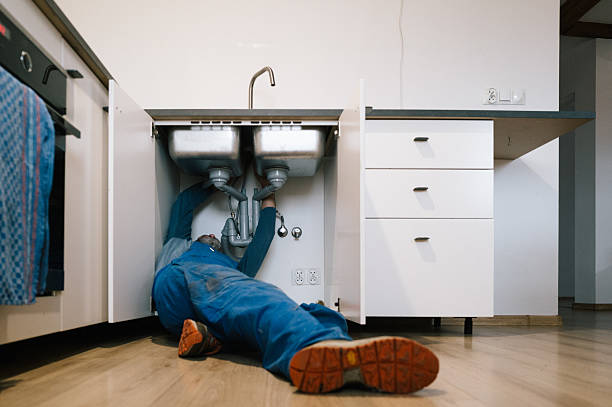 Professional Emergency Plumber technician working in Waldron, IN